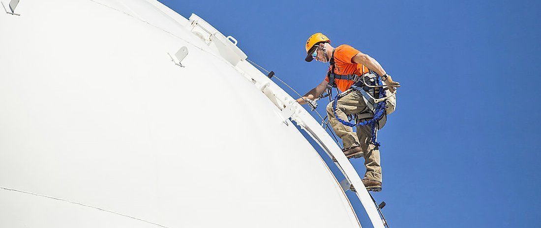 Tower Climber Performs Field Site Maintenance