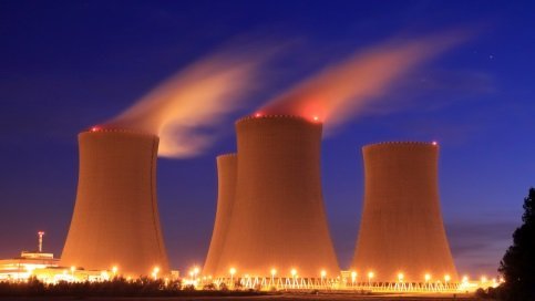 Hyperbolic cooling towers are marked by red or white tower lighting systems