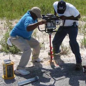 Installing A704 runway edge lights at Arthur's Town Airport in the Bahamas