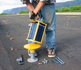 Solar airfield and obstruction lights are rapidly deployable and portable