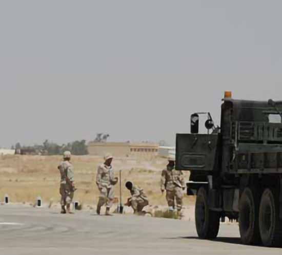 solar runway edge light installation at a Persian Gulf base