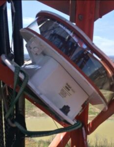 A nested LED beacon mounted inside the tower at an angle