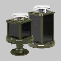 A compact and a standard sized A704 runway lights with olive drab chassis